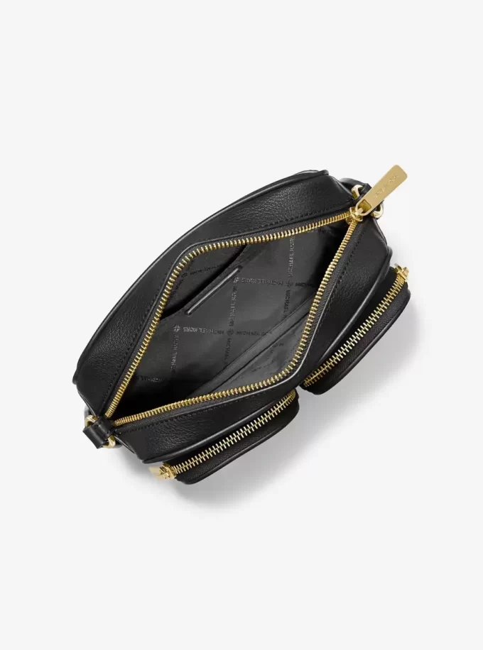 Kožená crossbody taška Jet Set střední velikosti s pouzdrem pro Apple Airpods Pro® Kožená crossbody taška Jet Set střední velikosti s pouzdrem pro Apple Airpods Pro®