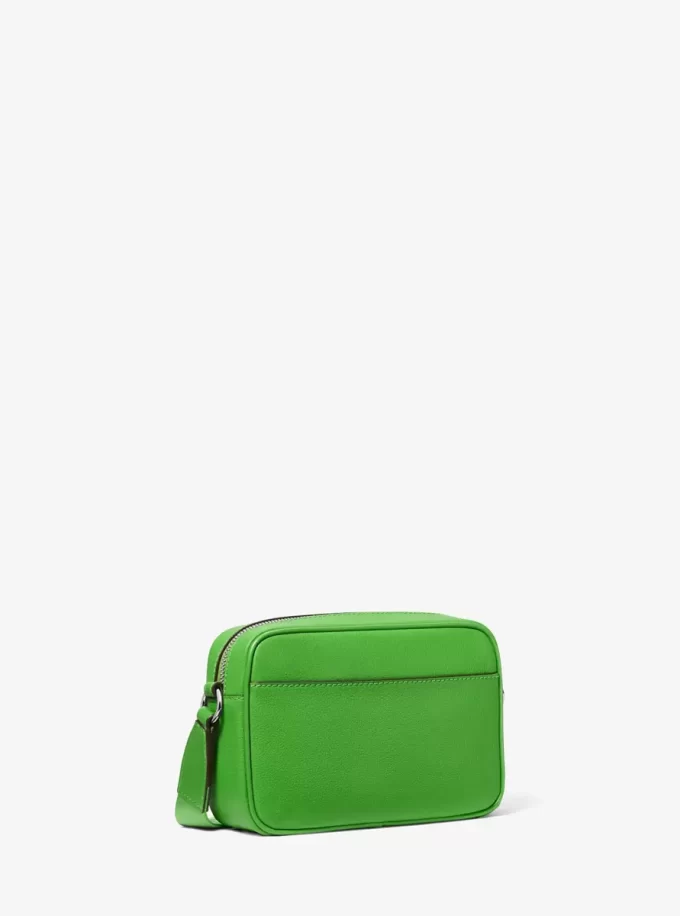 Kožená crossbody taška Jet Set střední velikosti s pouzdrem pro Apple Airpods Pro® Kožená crossbody taška Jet Set střední velikosti s pouzdrem pro Apple Airpods Pro®