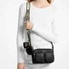 Kožená crossbody taška Jet Set střední velikosti s pouzdrem pro Apple Airpods Pro® Kožená crossbody taška Jet Set střední velikosti s pouzdrem pro Apple Airpods Pro®