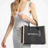 Středně velká kabelka Mirella ze semiše a imitace ovčí kůže Středně velká kabelka Mirella ze semiše a imitace ovčí kůže
