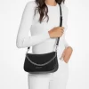 Středně velká kožená crossbody kabelka Carmela Pebbled Středně velká kožená crossbody kabelka Carmela Pebbled