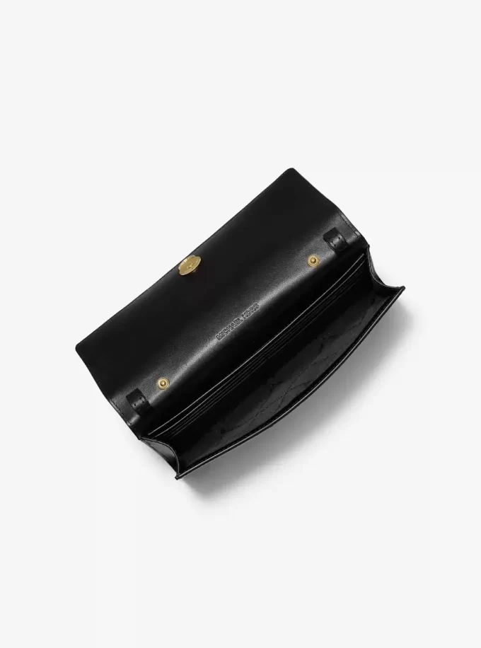 Velká crossbody kabelka Carson s leopardím potiskem a telecí srstí Velká crossbody kabelka Carson s leopardím potiskem a telecí srstí